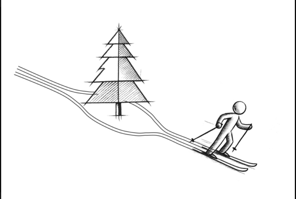 Skifahrer und Tanne